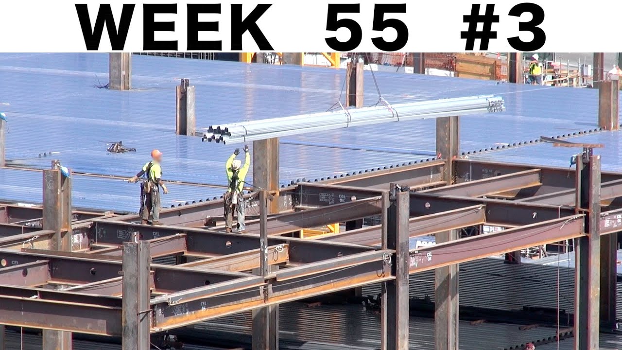 Tower crane delivering metal decking: 