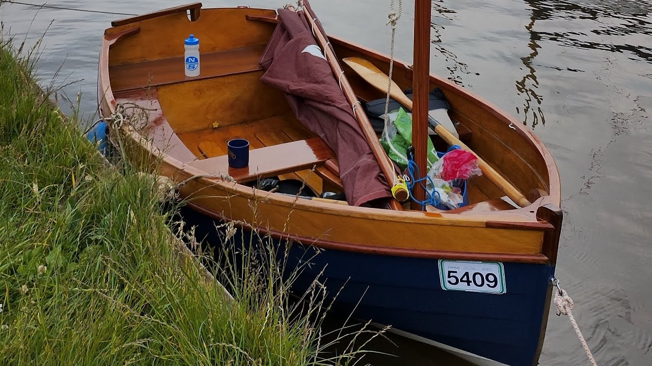 Exploring the beautiful Norfolk Broads in a small sailing boat