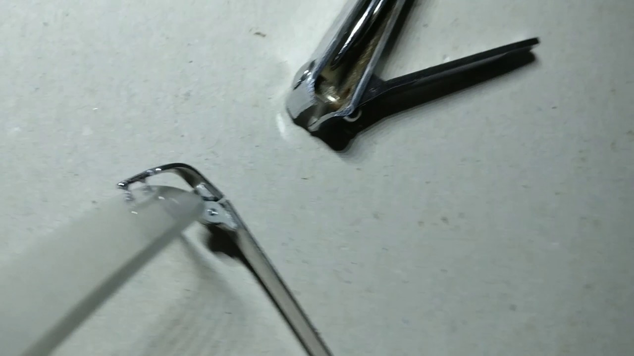 Changing rimless eyeglass compression bushings without any special pliers