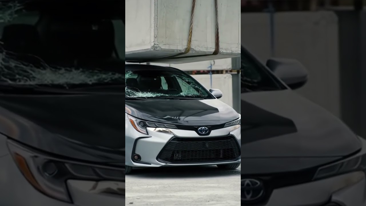 a dusty features ai zone construction yard, a sliver& Black latest-generation Toyota Corolla