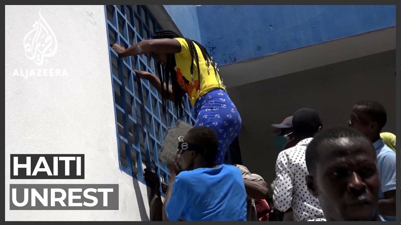 Haiti police stations stormed to free detained officers