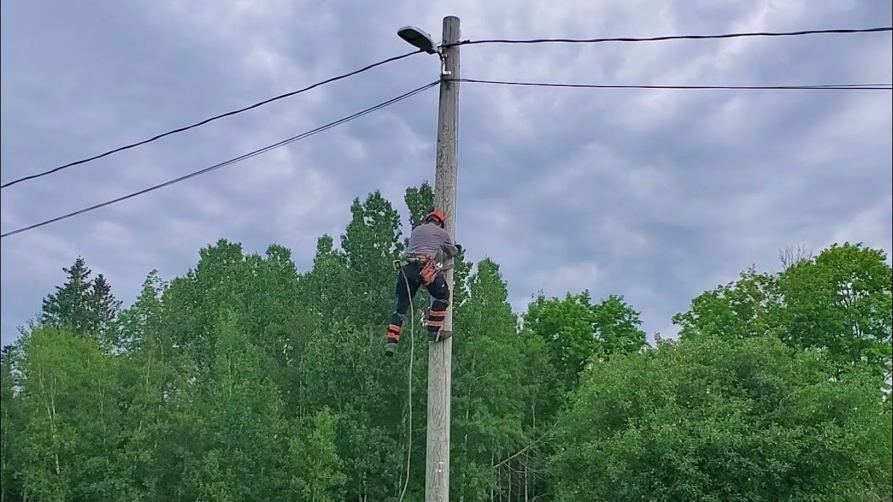 Climbing a pole to install a new light!