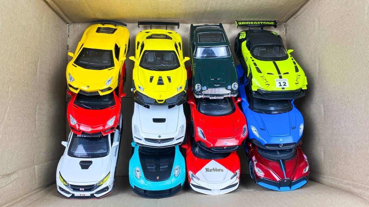 Box Full of Model Cars -Mazda Mx5, Koenigesgg Jesko, Lamborghini Scv12, Byd Yang Wang U8, Toyota Car