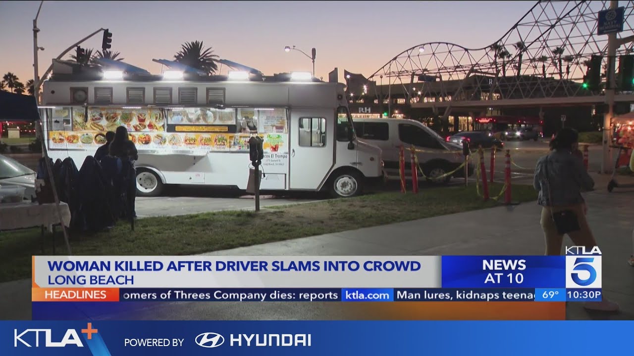 Woman killed after driver slams into crowd