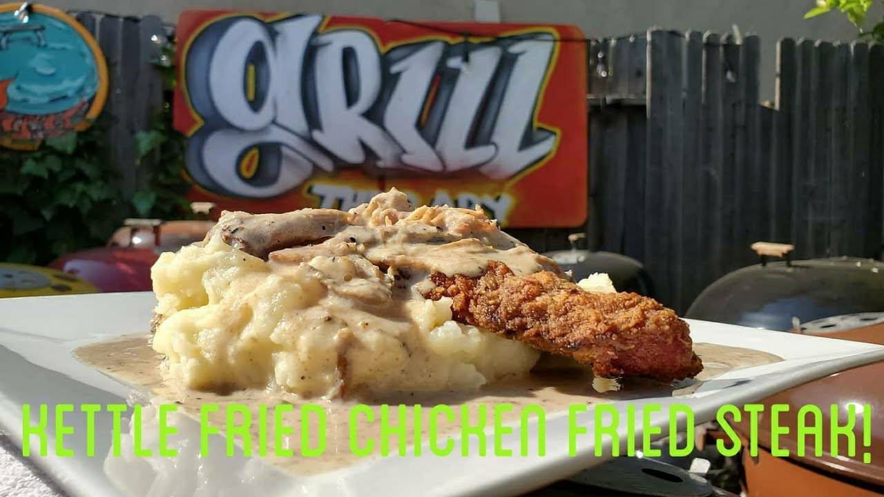 Kettle fried Snake River Farms Farms new York steak dinner with redeye pulled pork gravy and mash