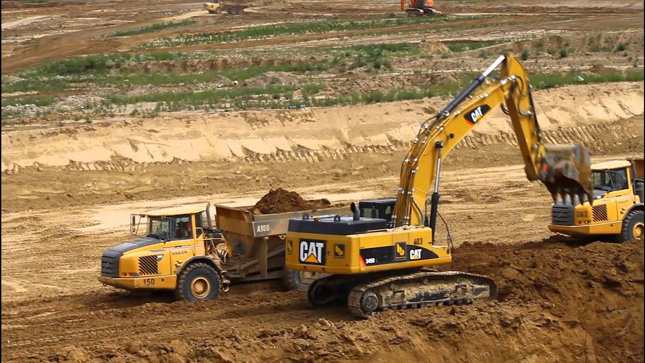 Cat 345 D mit Volvo A30D.wmv