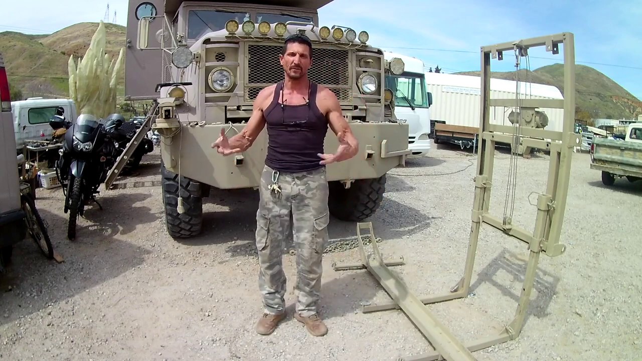 Front mounted motorcycle lift on Big Momma M923A2 extreme RV.