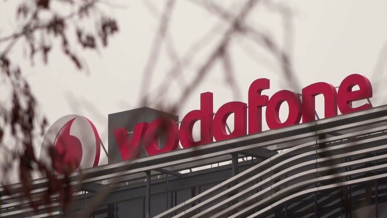 Vodafone cuts outlook as economic woes mount