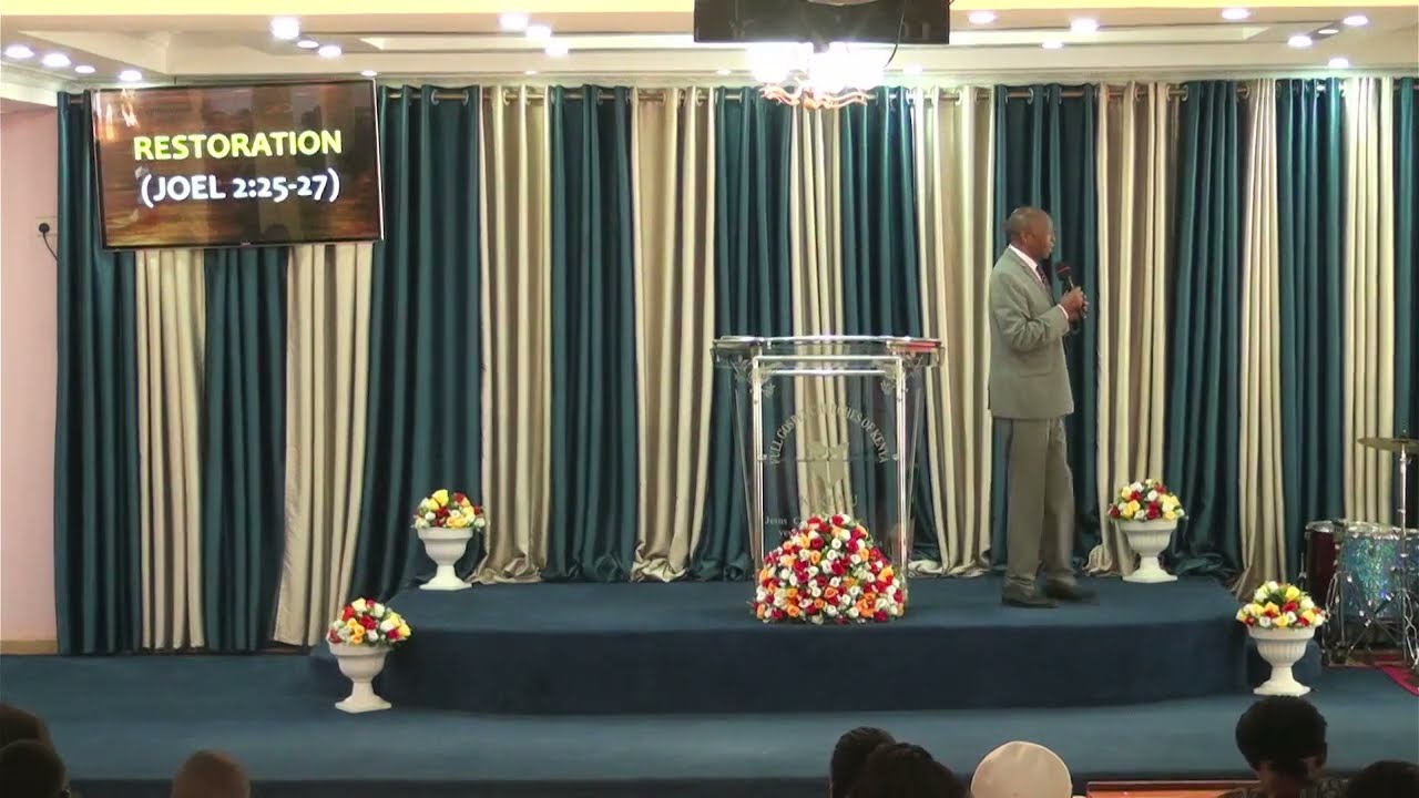 God Of Restoration. By Bishop Simon Gitonga