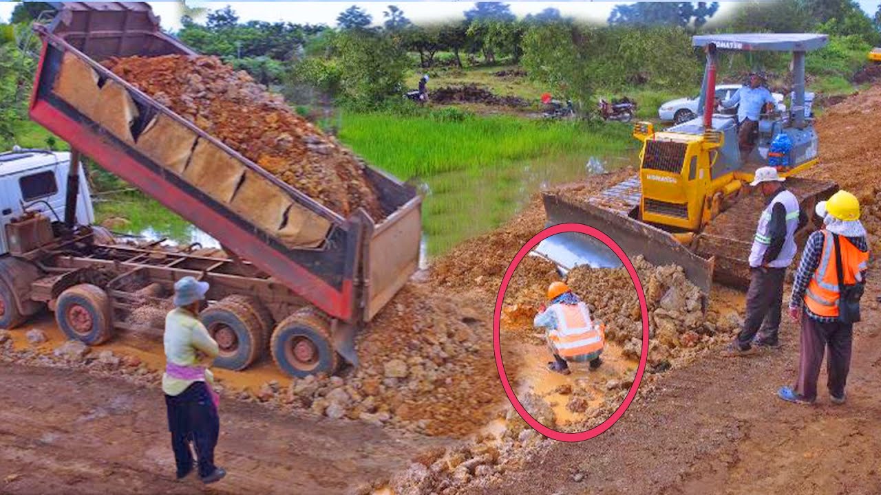 Best Action! Dozer tries to push the soil with great force to complete the special plan of the road