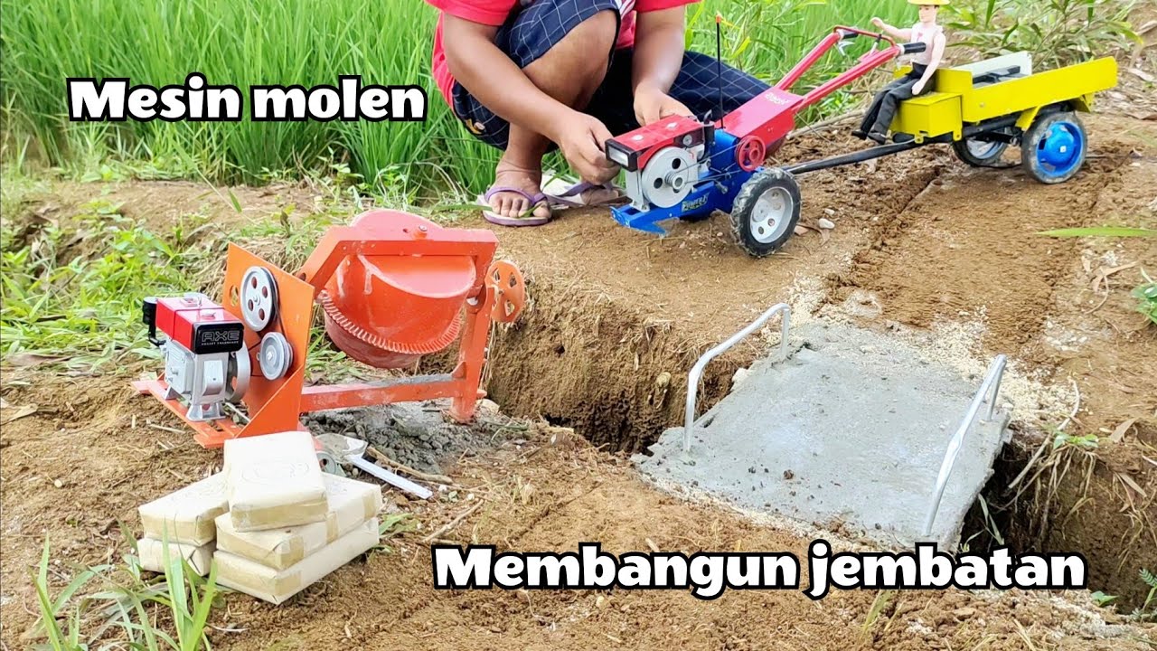Traktor sawah kecil dan mesin molen cor pengaduk semen membuat jembatan