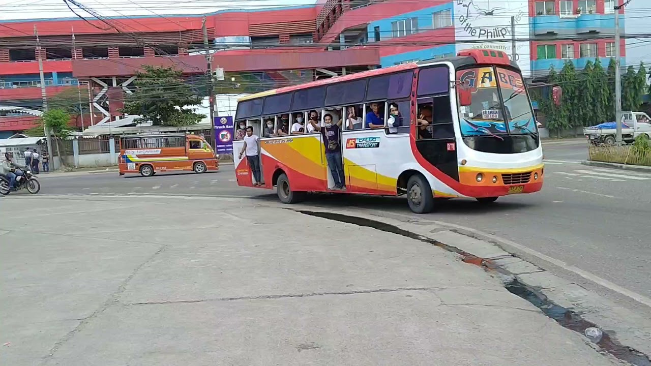 JS Calvo Transport with acrobatic bus helper
