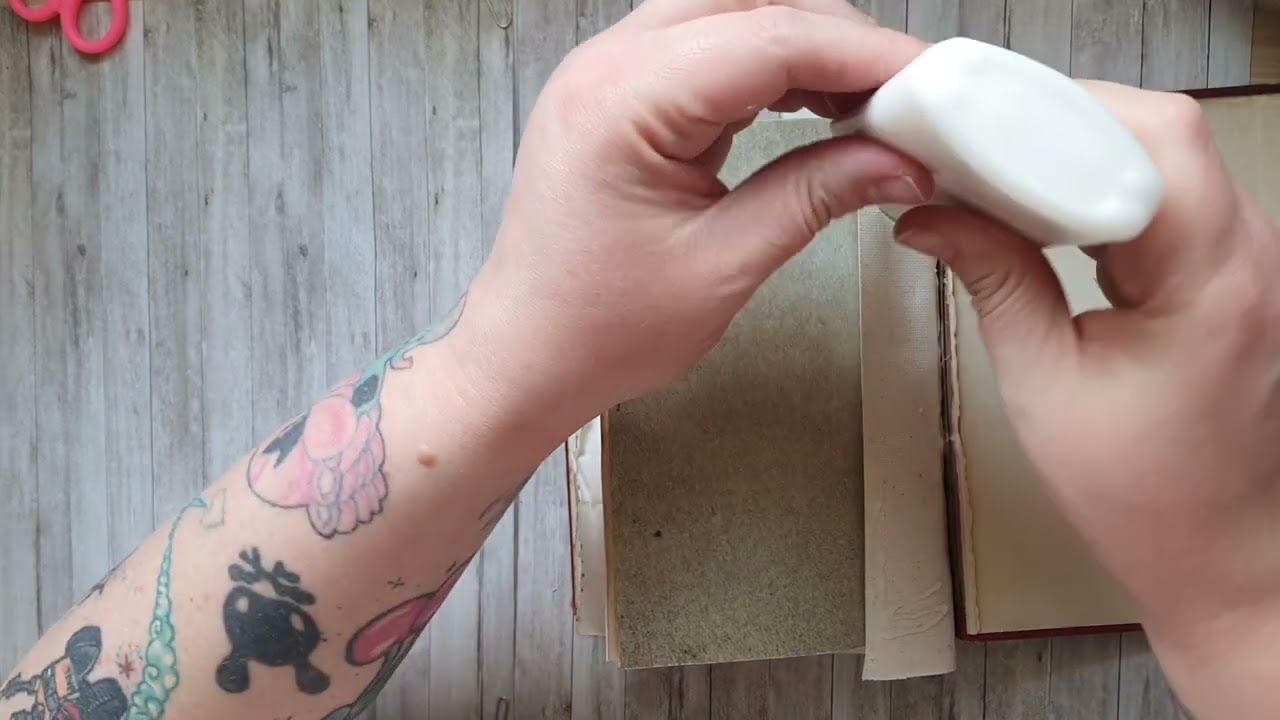 part 2 of sewing a junk journal with an old book cover