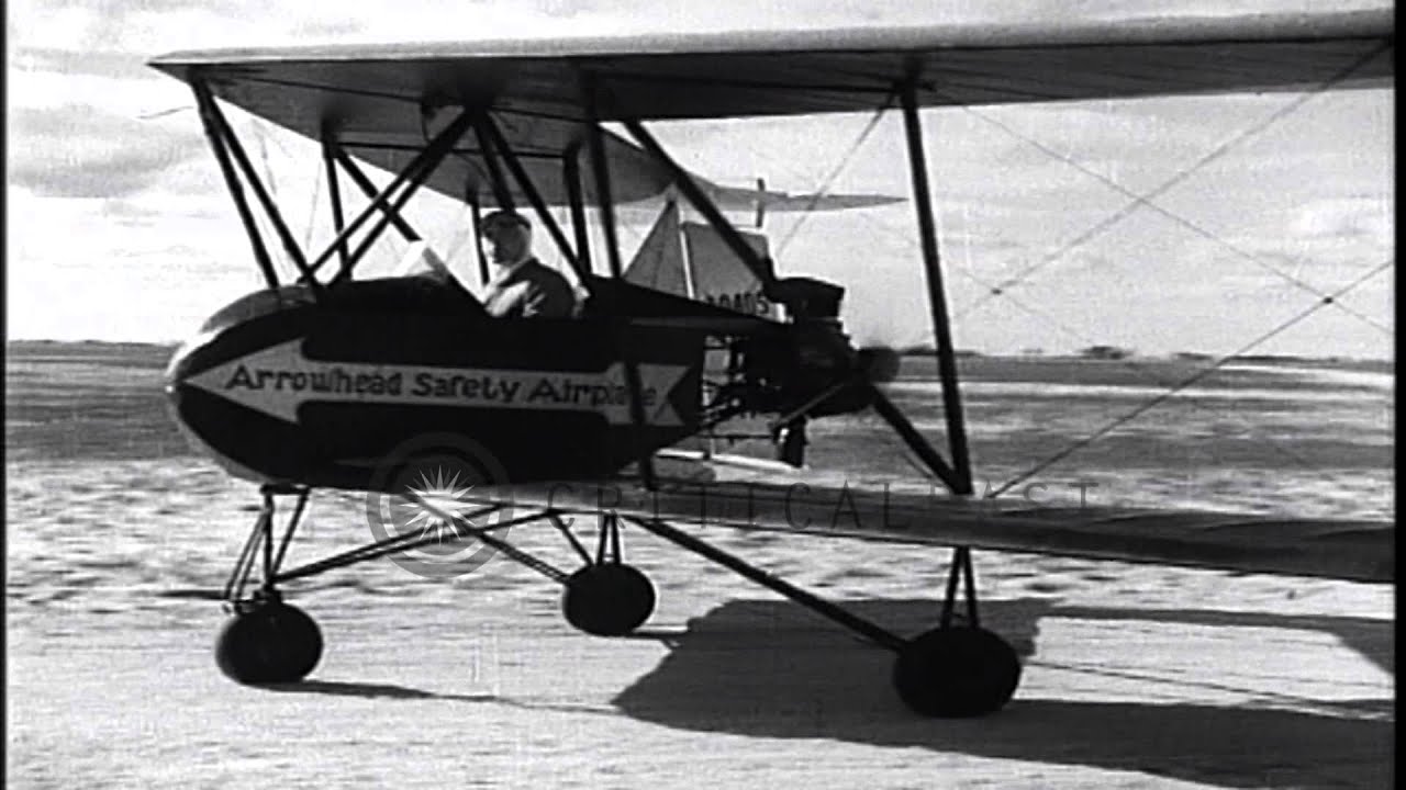 Arrowhead Safety Plane of 1930's flying in the air. HD Stock Footage