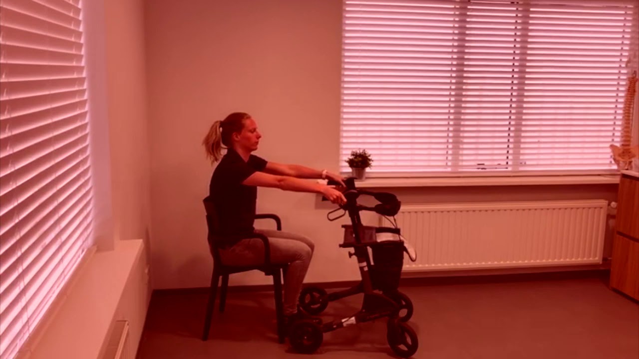 Stoel transfer met rollator