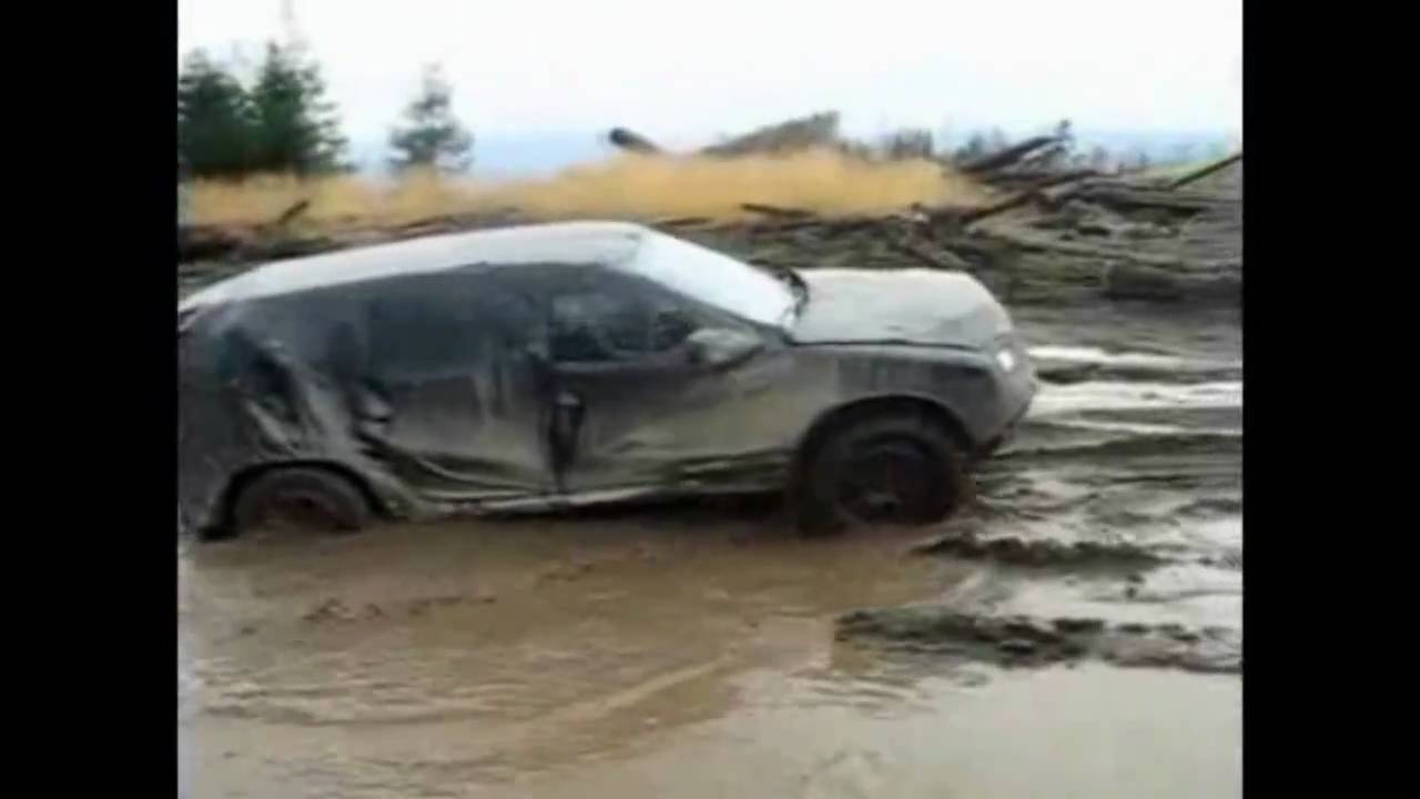 Dacia Duster testing its 4x4 skills in the mud, off road