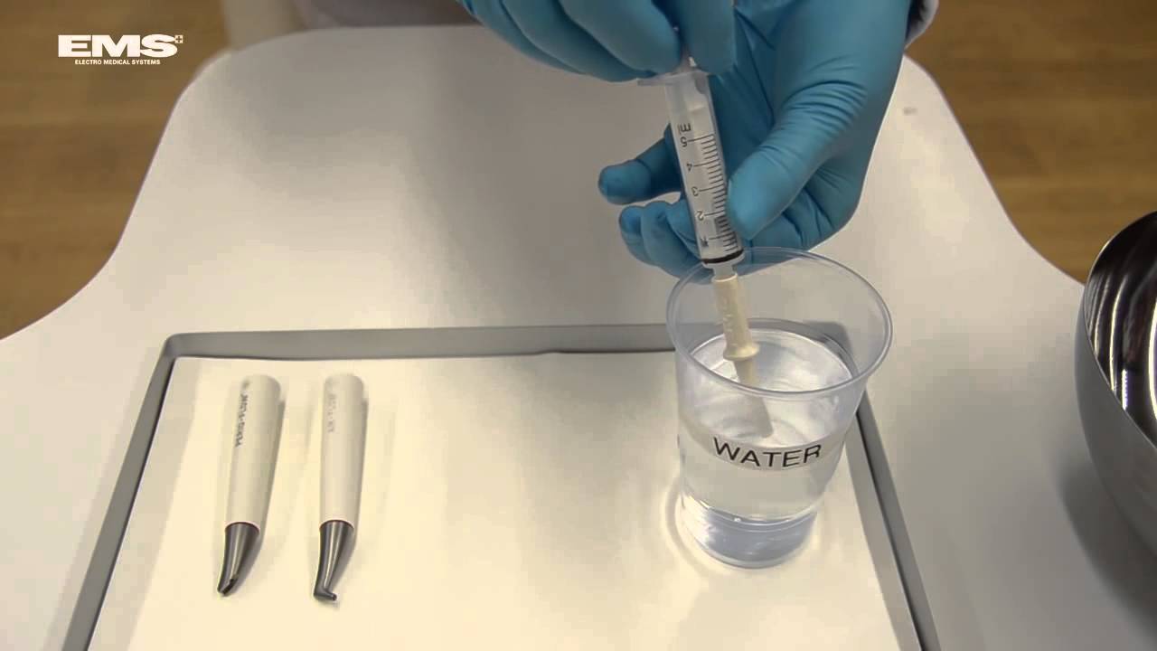 Remove powder residues from AIR FLOW handpieces