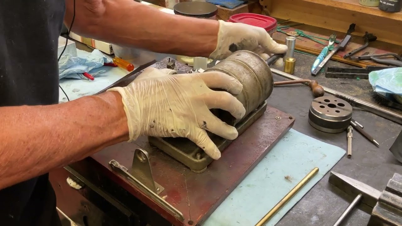 1671.  How to remove spring barrels from the phonograph motor chassis￼