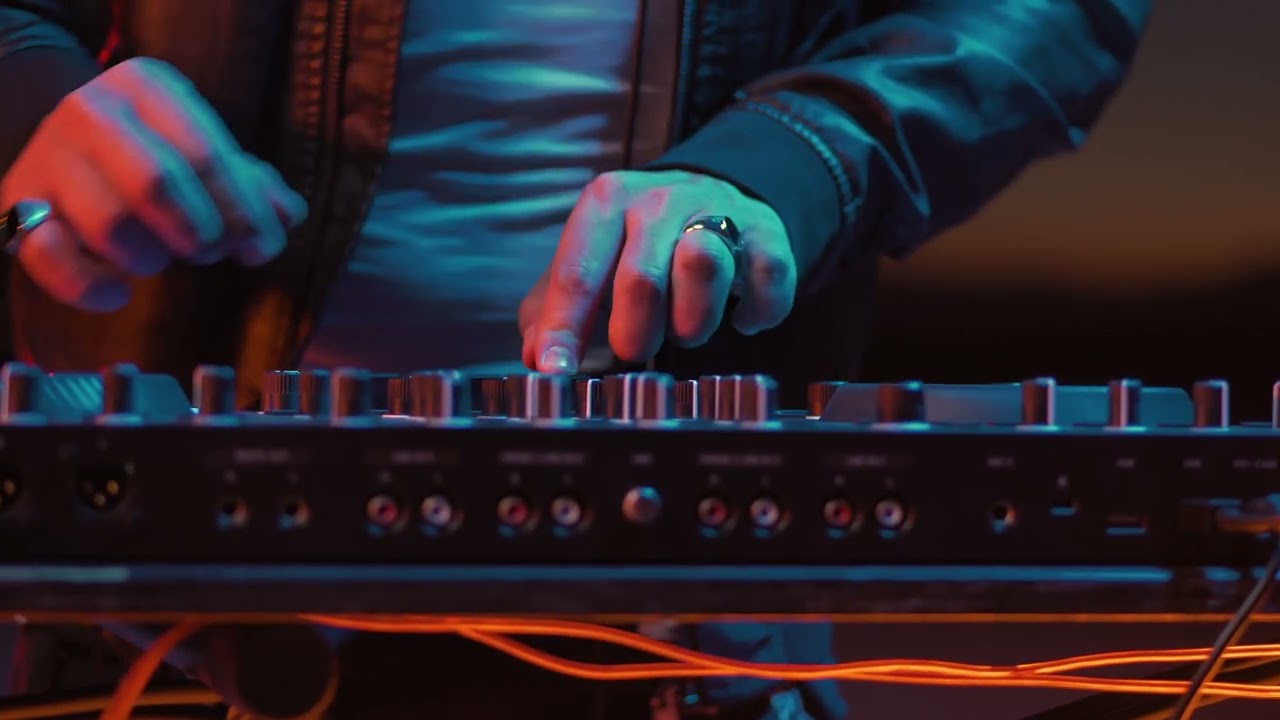HANDS OF A DJ TURNING KNOBS ON A TURNTABLE - FREE STOCK VIDEO FOOTAGE