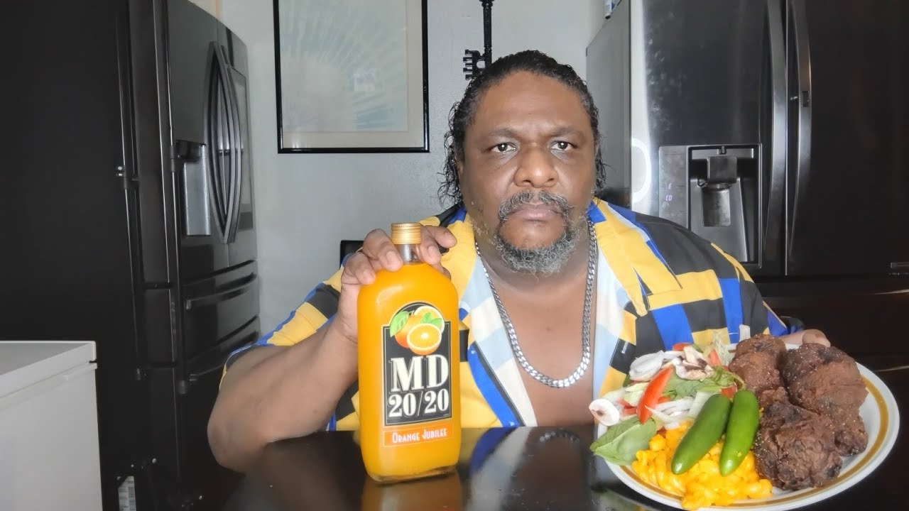 TERIYAKI fried Chicken macaroni & cheese a salad with a bottle of MD 20/20 I made my own mix drink