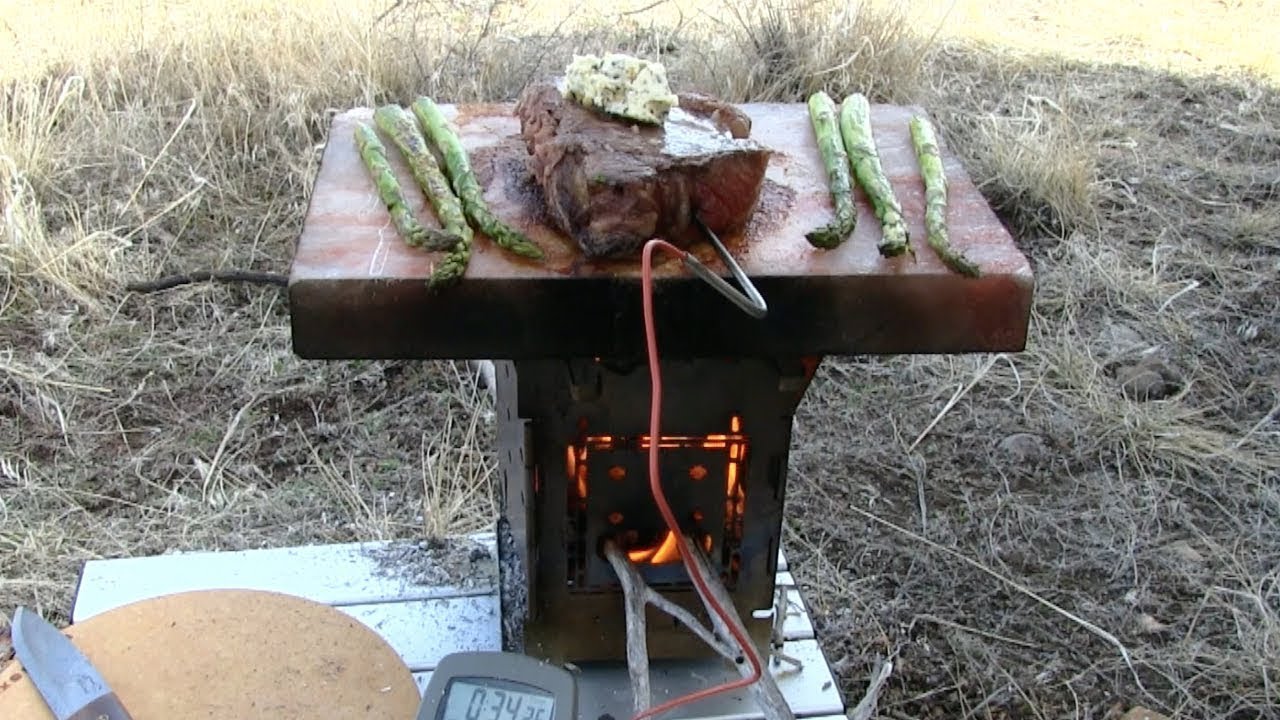 Salt Block Reverse Sear New York Steak Over A Wood Fired Firebox Stove.