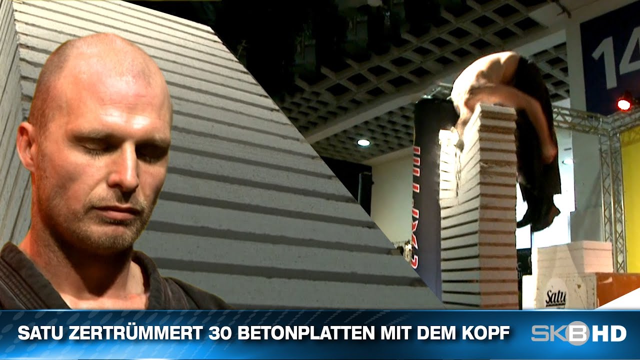 SATU ZERTRÜMMERT 30 BETONPLATTEN MIT DEM KOPF