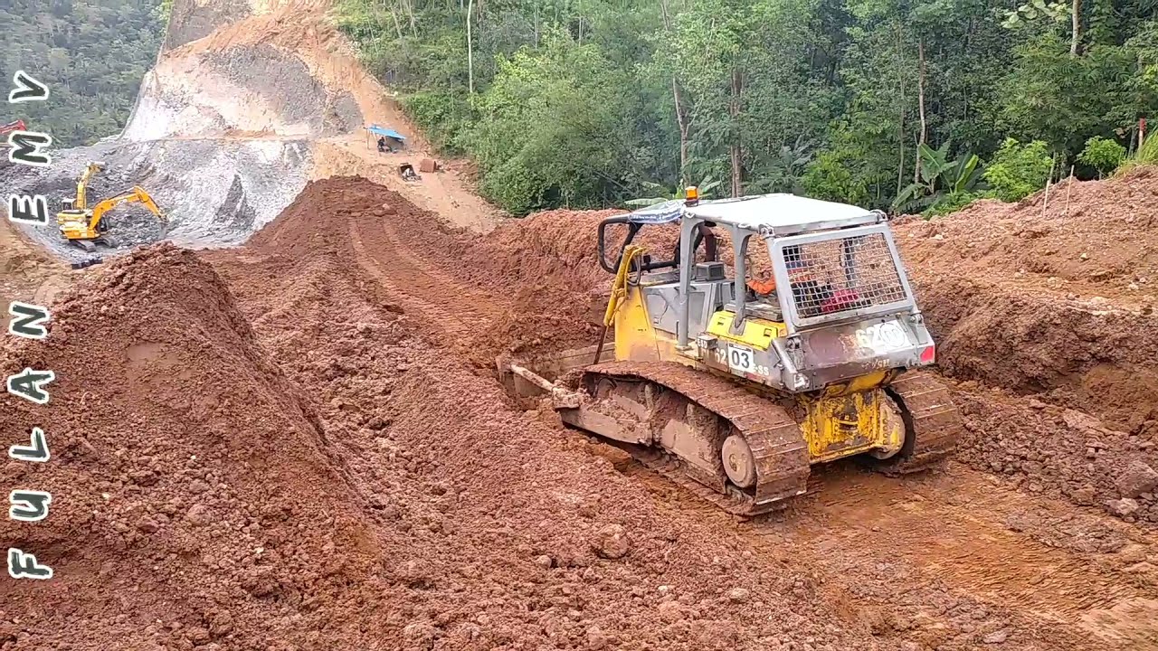 Komatsu D85eSS Bulldozer and Komatsu PC200-8 Excavator Making Road