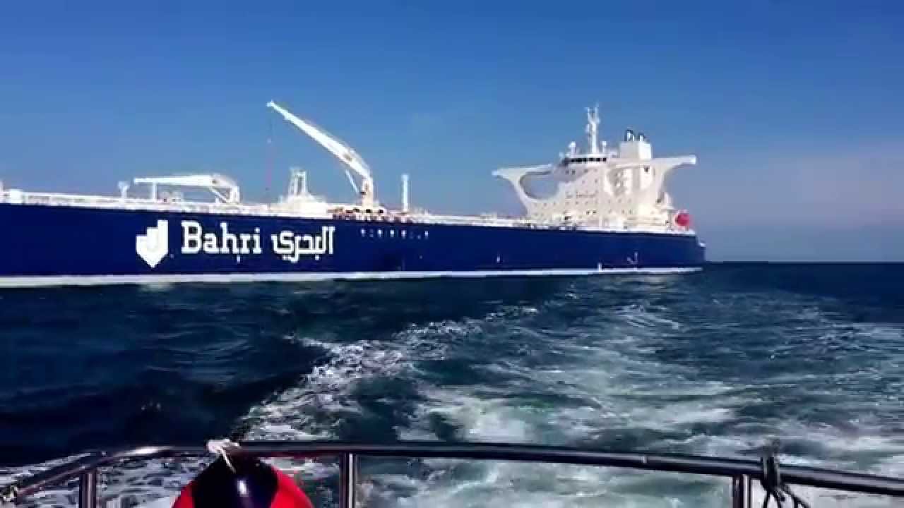 ENORMOUS SHIP!! Pilot swinging from crane over water!!  ULCC Ghazal