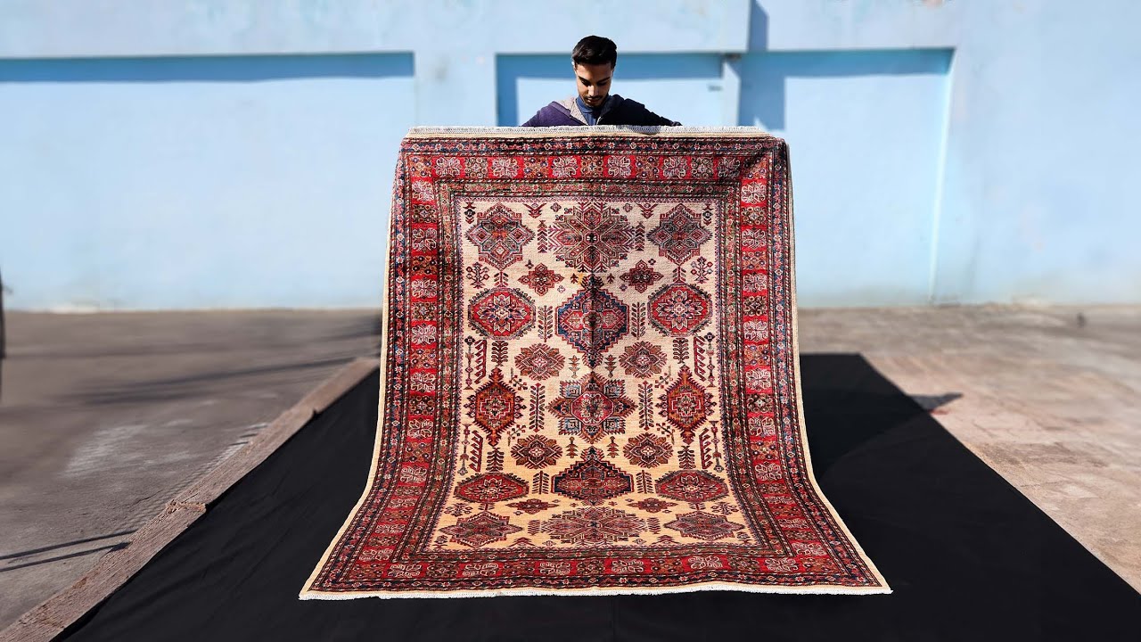 The 6×8 Ivory & Red Kazak Rug: A Masterpiece of Elegance and Tradition