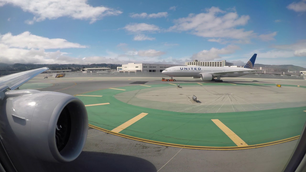 United Airlines B777-300ER Taxi and Takeoff from San Francisco (with Fog)