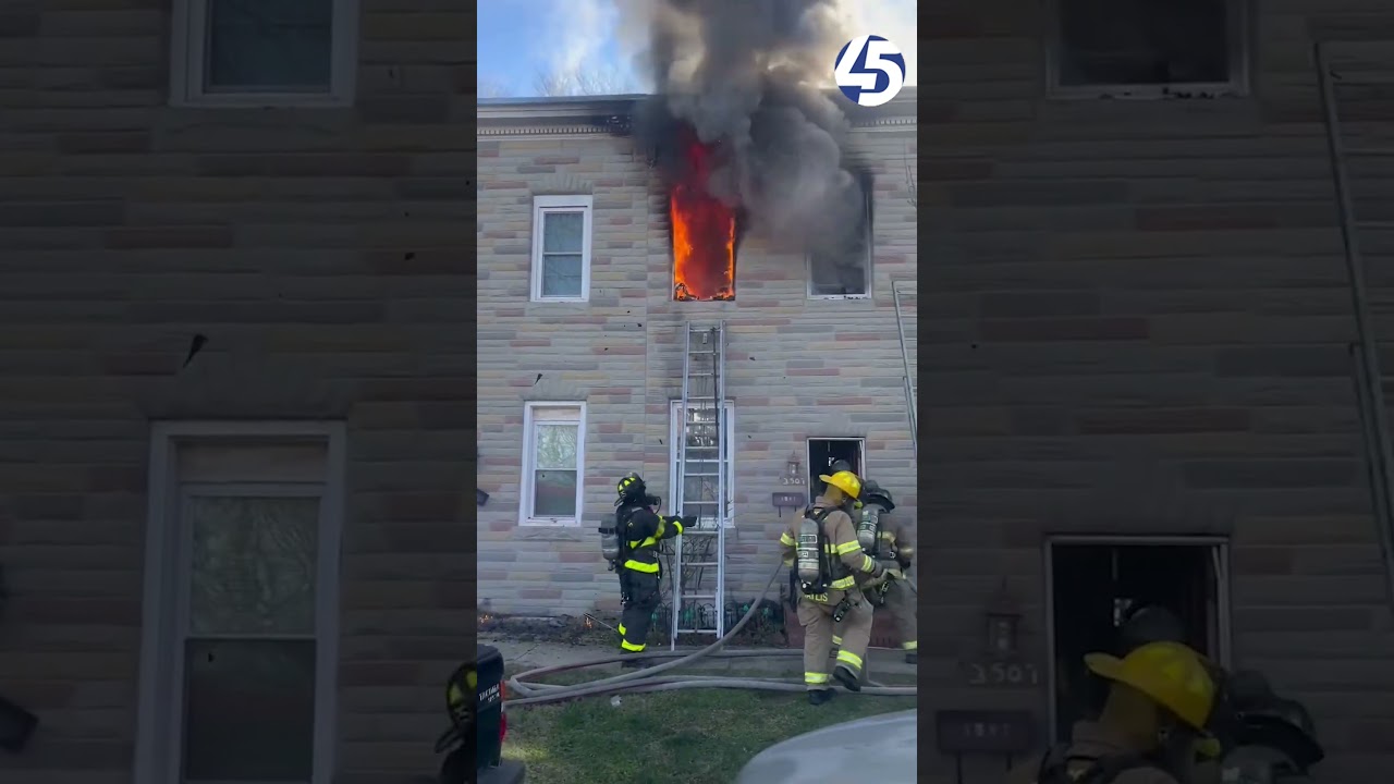 Baltimore fire crews battled a house fire in the Brooklyn neighborhood on Saturday morning