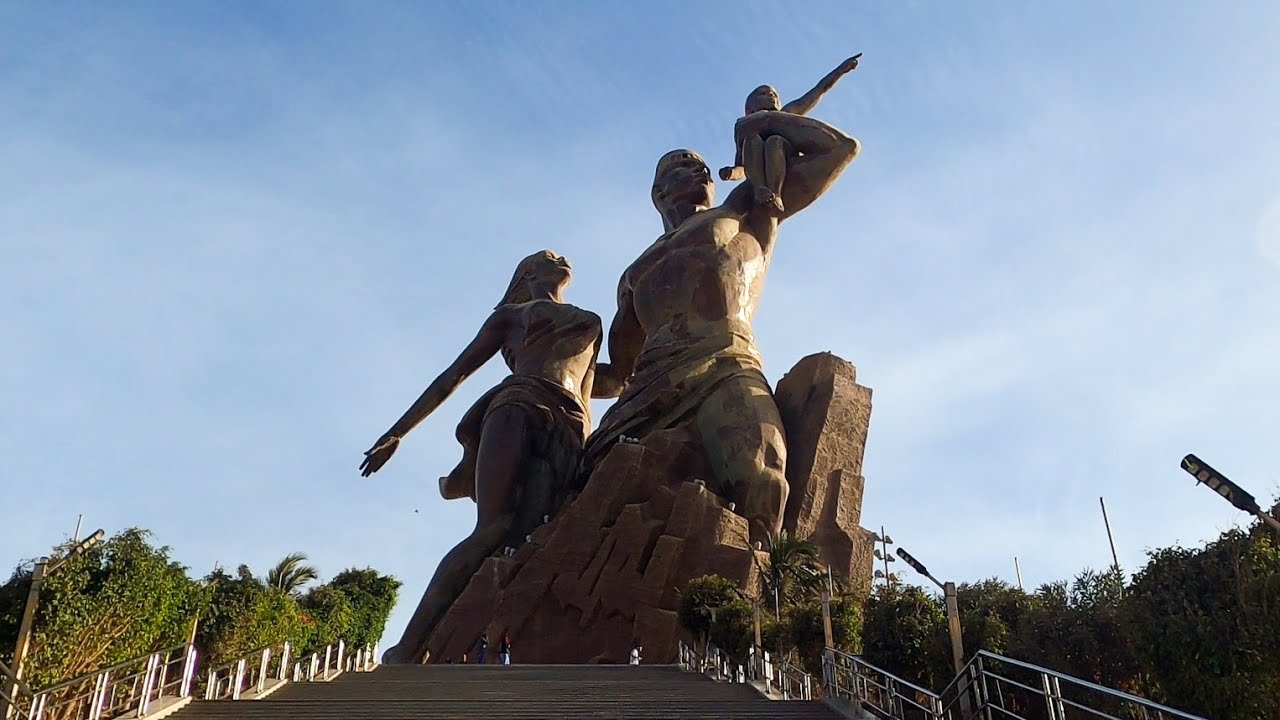 08: The North Korean Monument to African Independence | Traffic in Dakar | Motorcycle Journey |