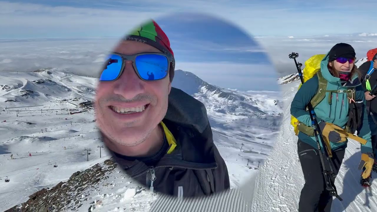 PICO VELETA, INVERNAL, SOBRE UN MANTO DE NUBES, CON SIERRA NEVADA ESPECTACULAR.