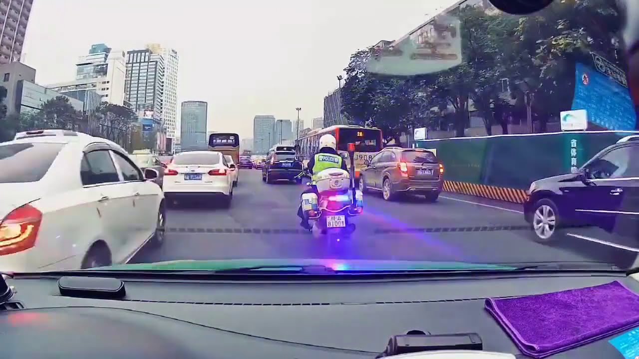 China motorcop escort patient on taxi to hospital through traffic jam