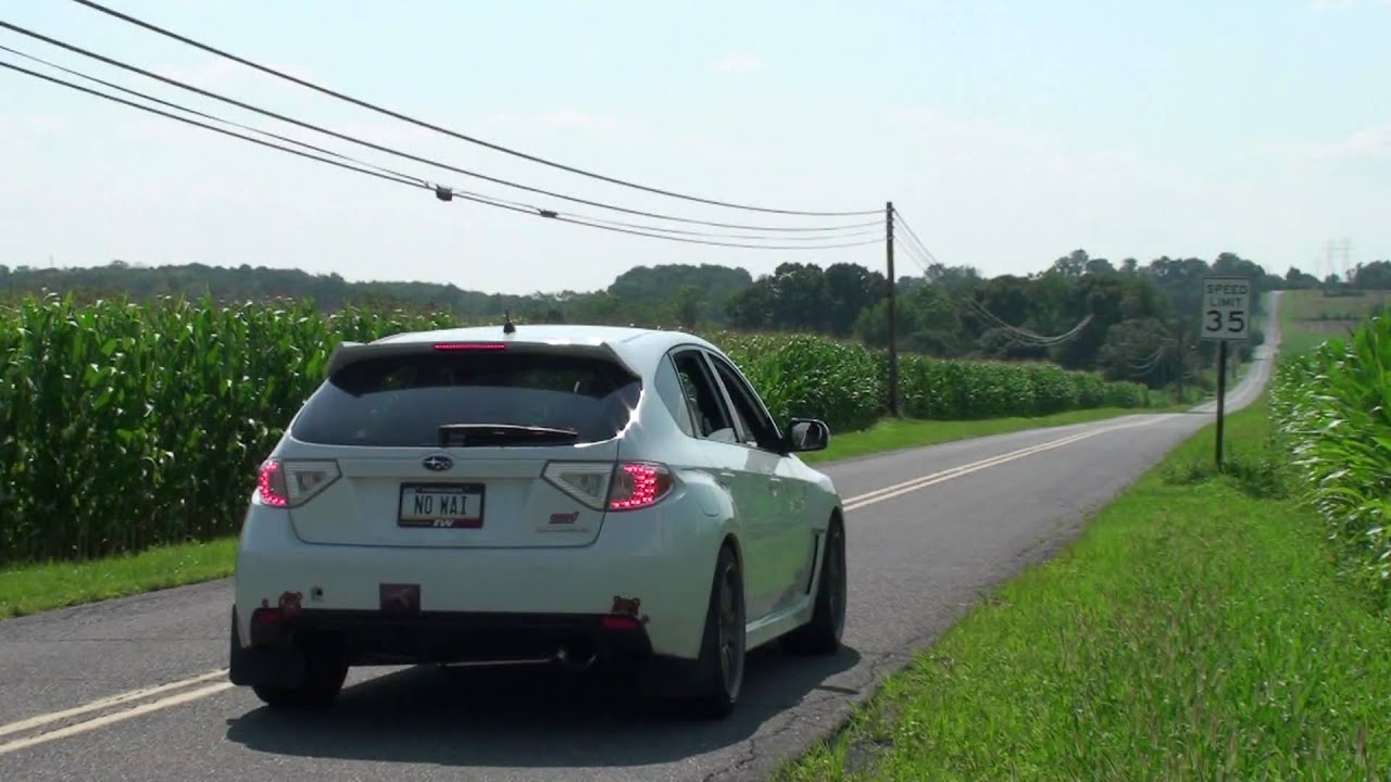 2008 STi w/ Invidia Catless Downpipe, Invidia N1 Resonated Ti Exhaust (External)