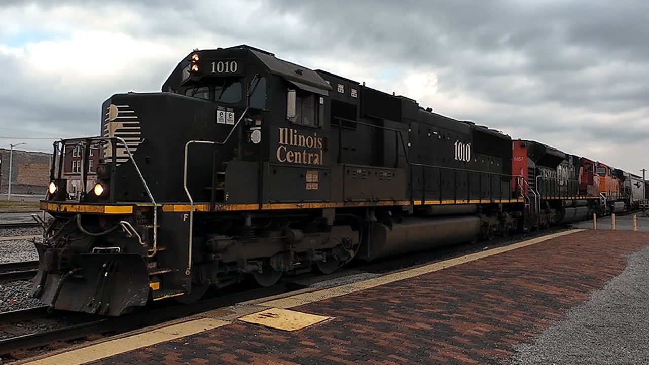 Illinois Central SD70 Leads a Colorful Lashup Through Centralia, IL
