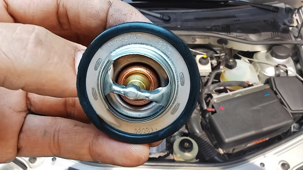 آموزش تعویض ترموستات ال90 و ساندرو (Dacia Logan and Sandro thermostat replacement tutorial) رنوشاپ