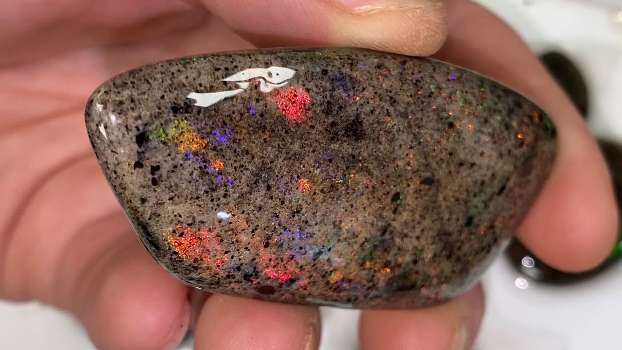 Resin treating rainbow matrix opal.