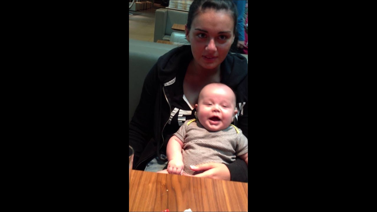 Baby laughing at what his daddy has to say. Too cute ..