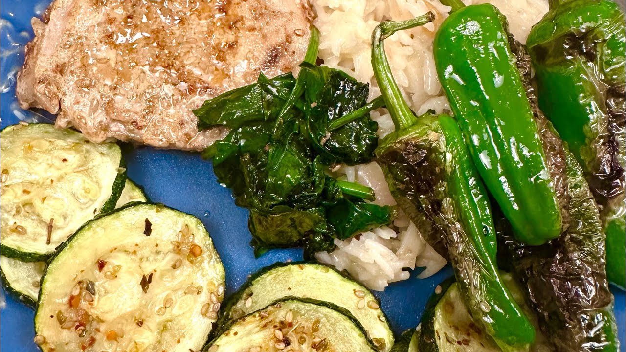 Tuna steak with rice and baked zucchini