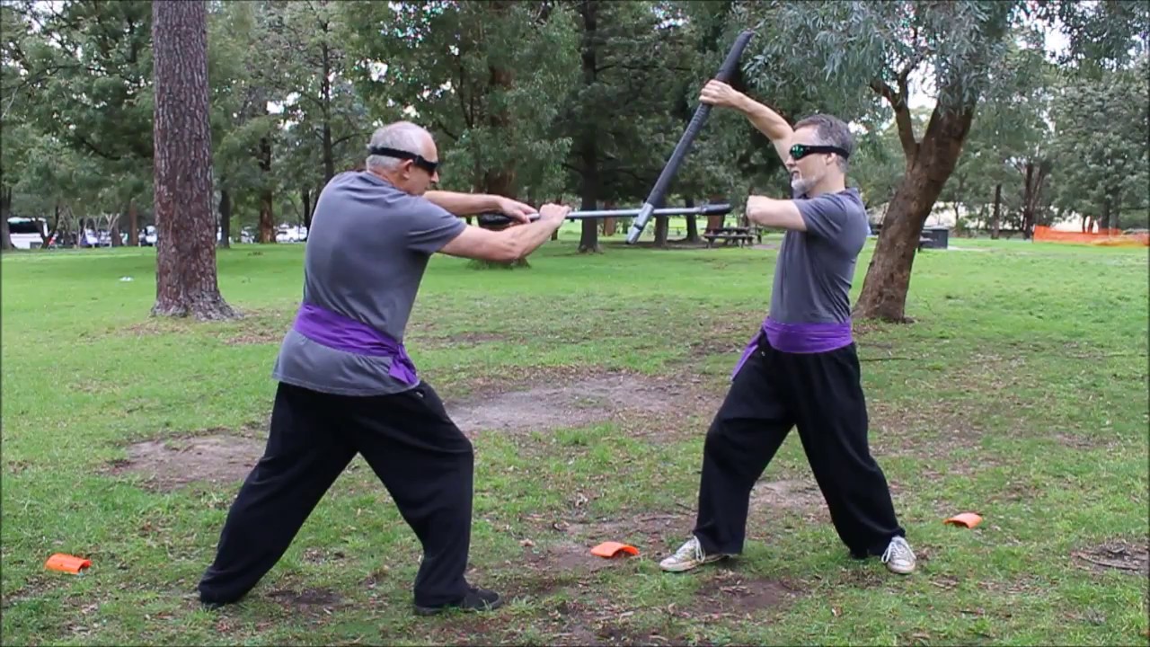 OzCane - Open side cane strike