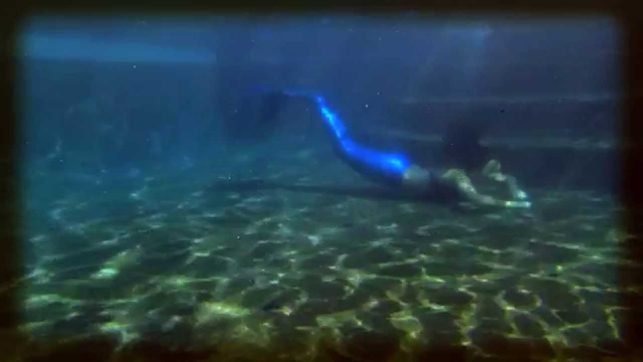 Mermaid Caroline swimming to 