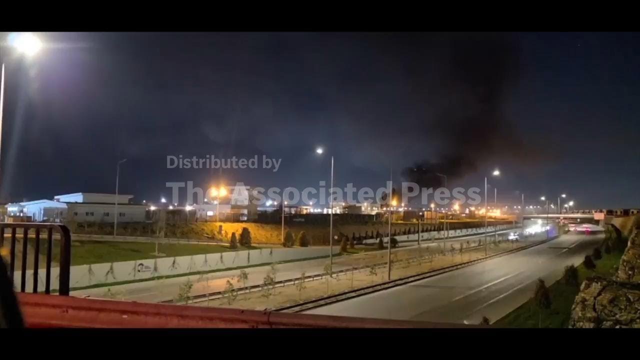Smoke rises from Irbil airport area in Iraq after drone attacks over the city