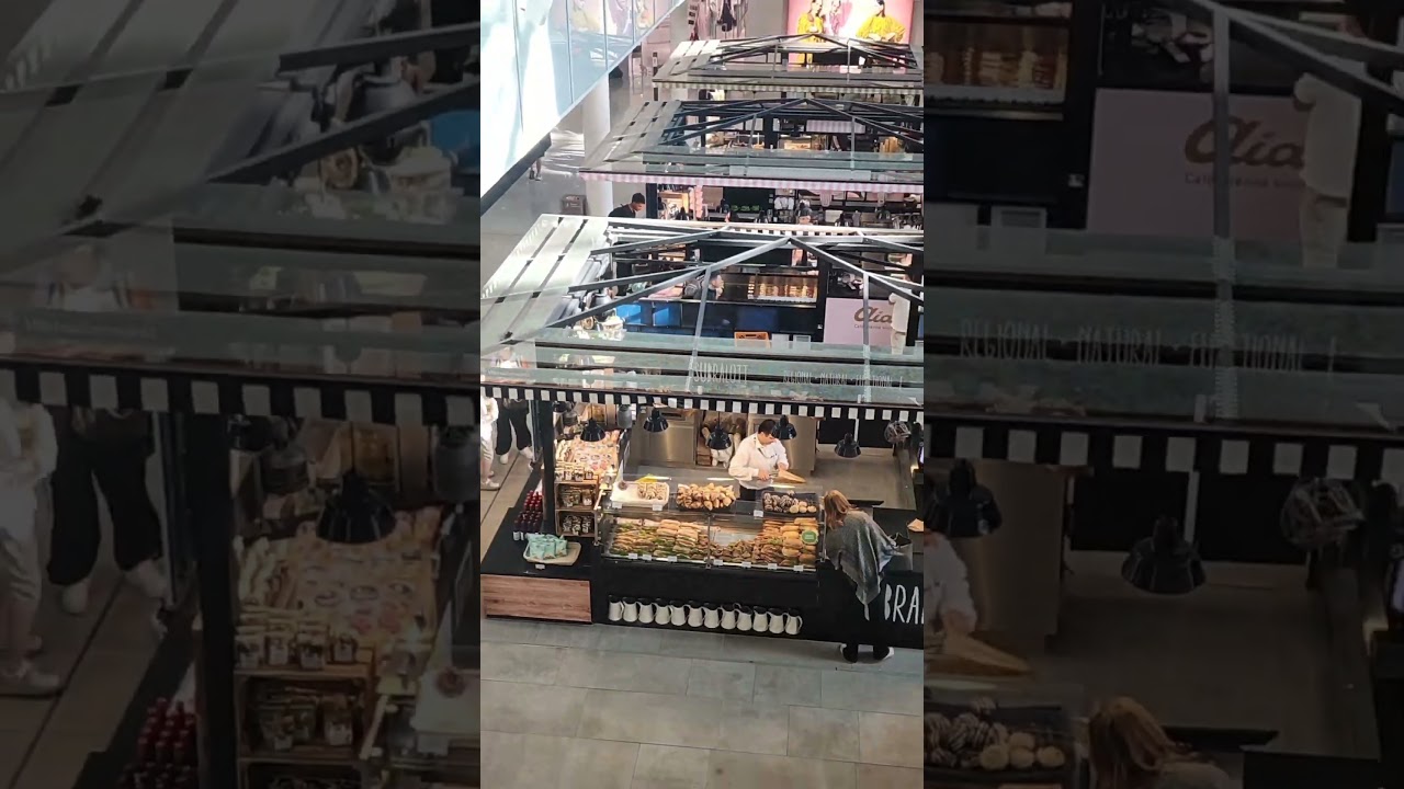 Billboard Screened Terminal Lobby seen from dining window, Munich Airport, Germany Europe (8/6/2025)