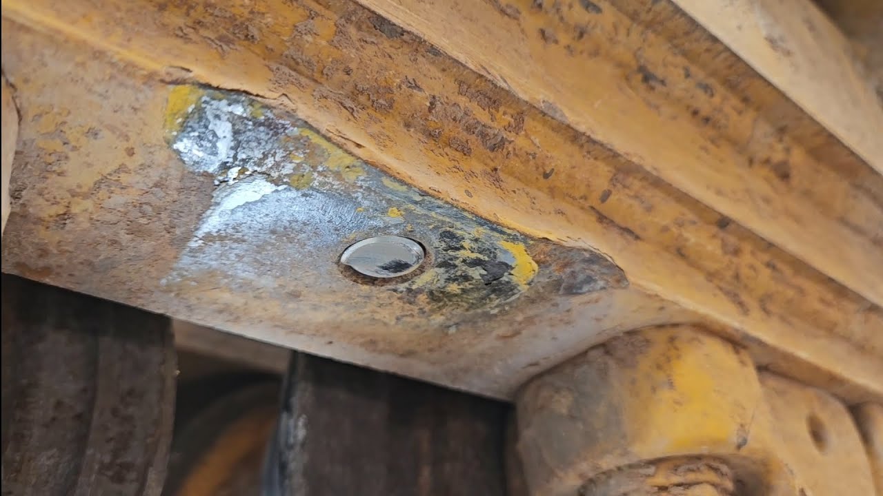 John Deere 850L rock guard bolt extraction