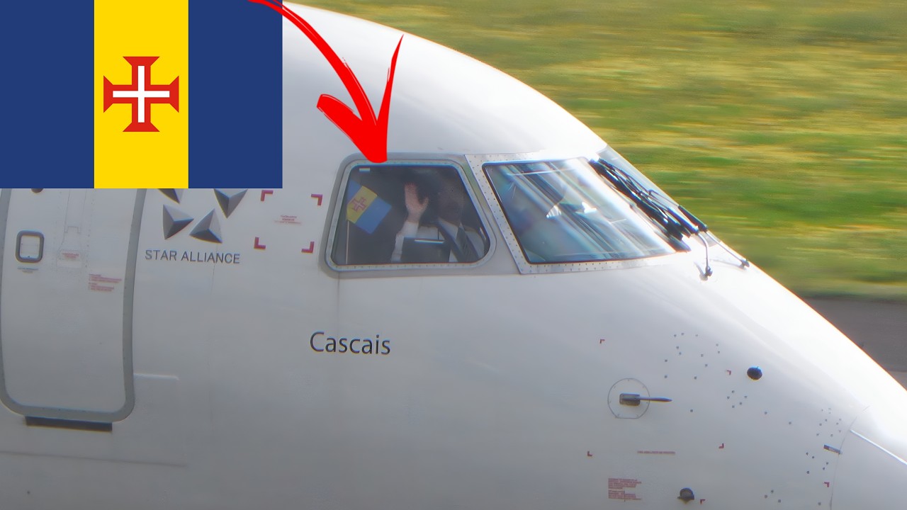 MADEIRA FLAG & PILOT WAVE TAP E190 at Madeira Airport