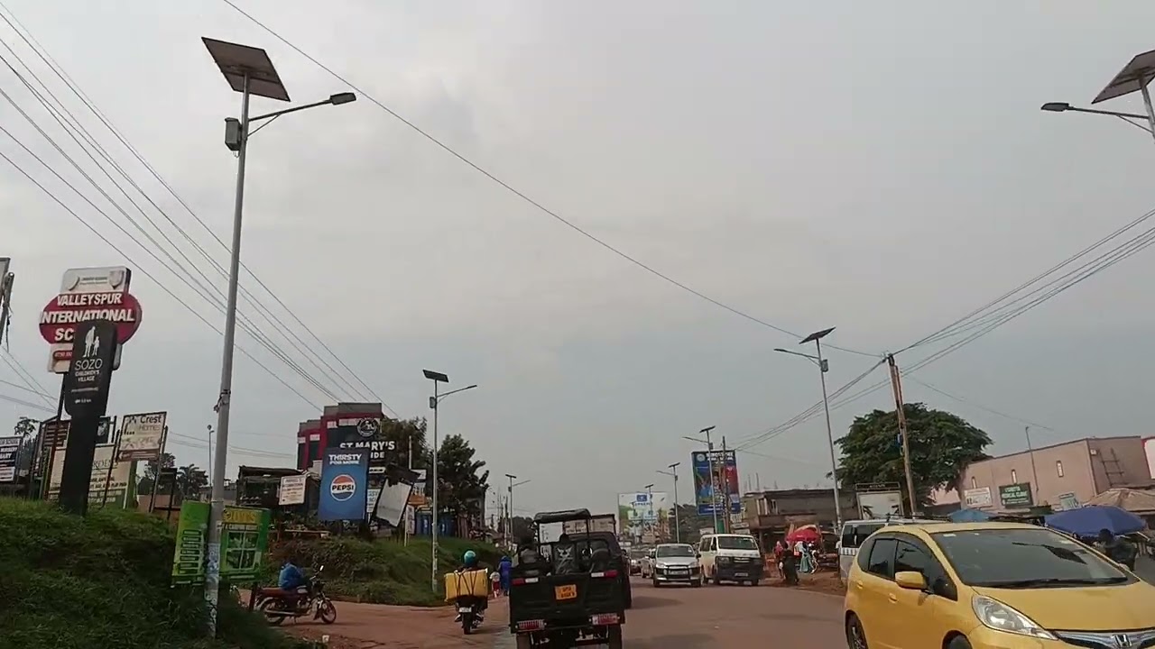 A drive on an uncongested road towards Uganda's city