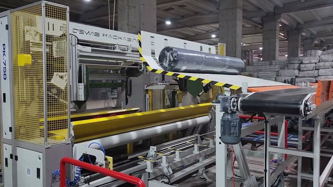 PK.750 FULL AUTOMATIC FABRIC ROLL PACKAGING MACHINE