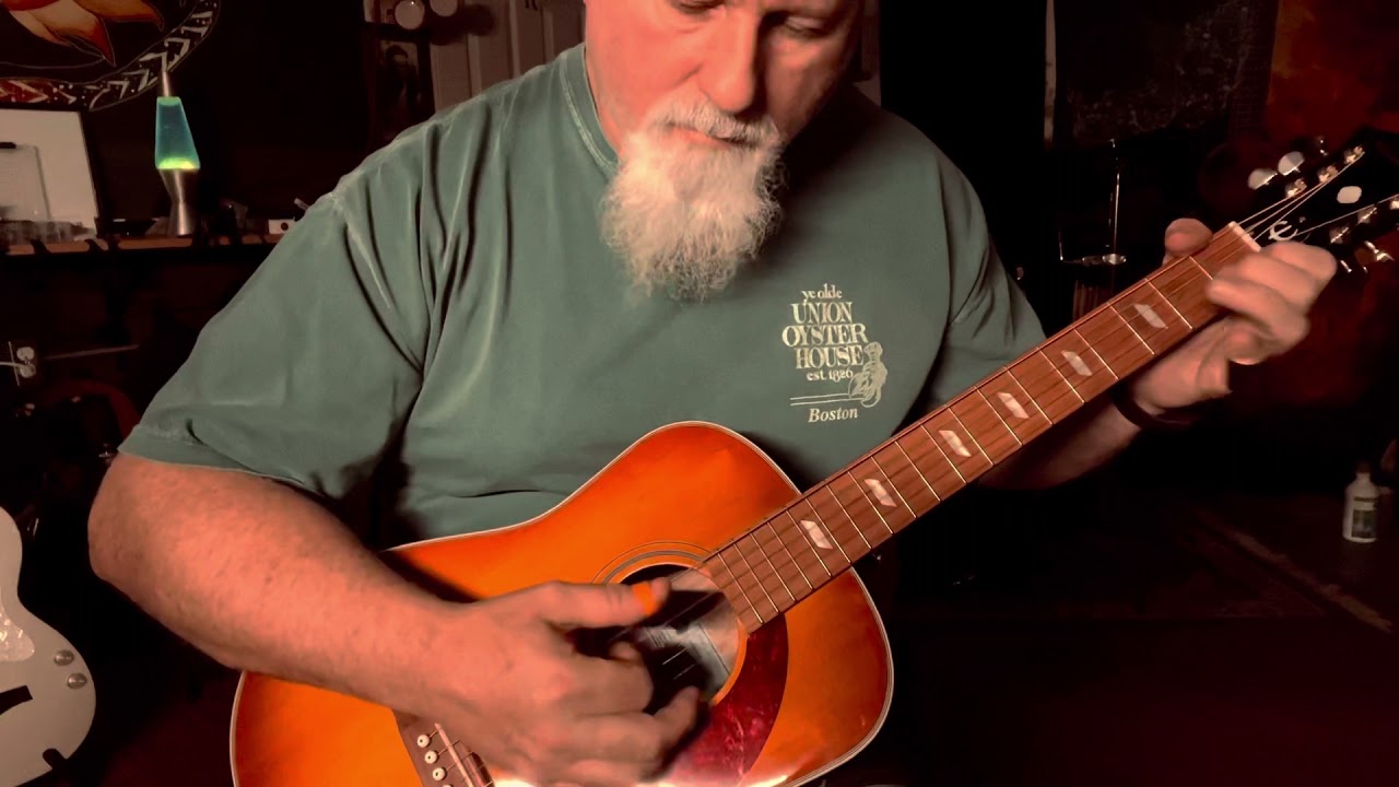 Epiphone Lil Tex.  Song called “My kind of Time” open G
