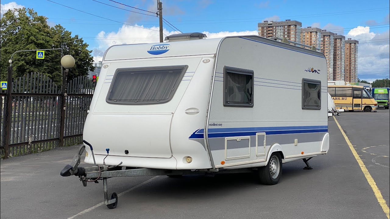 Hobby Excellent Easy 450 - немецкий кемпер 2004 года с двумя комнатами отдыха и санузлом посередине
